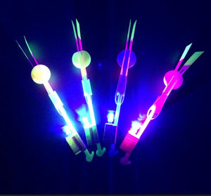 100Pcs/lot or 200pcs Light Arrow Flying Toy LED Light Flash Toys Party Fun Gift Rubber Band Catapult