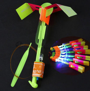 100Pcs/lot or 50pcs Amazing Light Arrow Rocket Helicopter Flying Toy LED Light Flash Toys Party Fun Gift Rubber Band Catapult